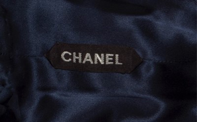 Lot 220 - A Chanel couture navy satin cocktail gown and...
