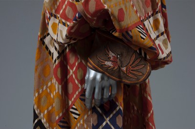 Lot 202 - A John Bates 'ethnic' look evening gown, early...