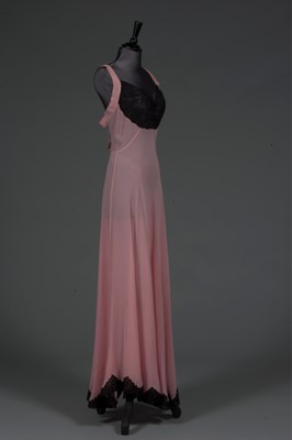 Lot 88 - A pale rose-pink chiffon and black Chantilly...