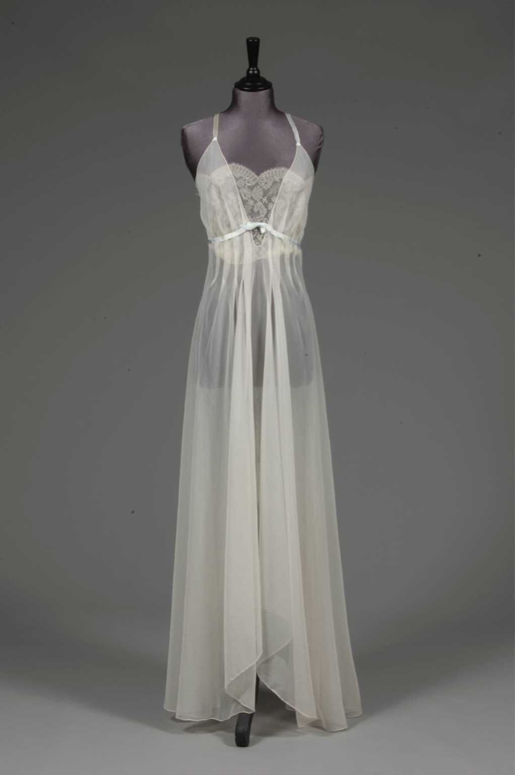 Lot 91 - An ivory chiffon nightdress, 1950s, with lace
