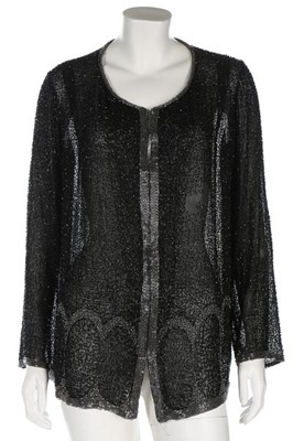 Lot 124 - A beaded lace flapper dress, late 1920s, with...