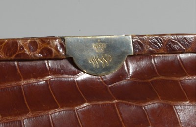 Lot 104 - An alligator handbag, bearing the cypher of...