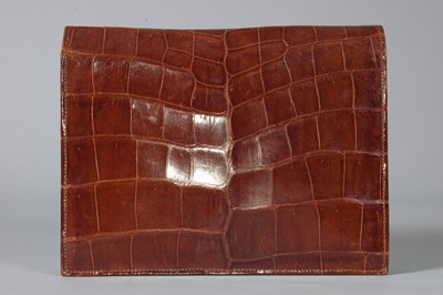 Lot 98 - A Cartier alligator clutch bag, circa 1938-40,...