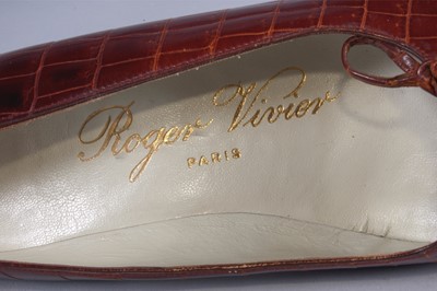 Lot 93 - A Roger Vivier melon shaped alligator pochette...