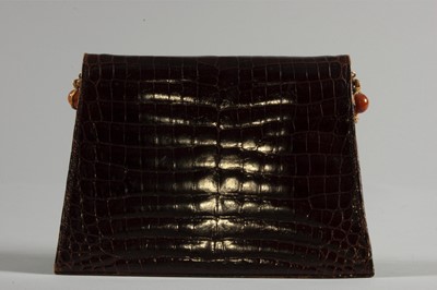 Lot 100 - A Christian Dior brown alligator handbag,...