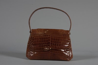 Lot 103 - A brown alligator handbag, probably Ferest,...