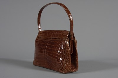 Lot 103 - A brown alligator handbag, probably Ferest,...