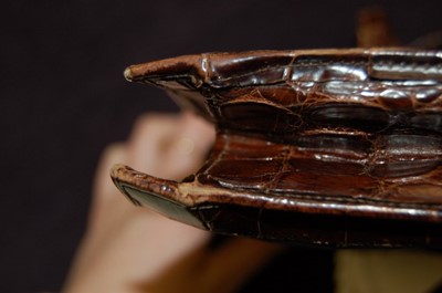 Lot 92 - A brown alligator handbag, circa 1947-50,...