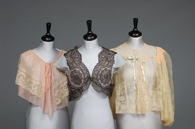 Lot 113 - Three lace boudoir jackets, 1930s-50s,...