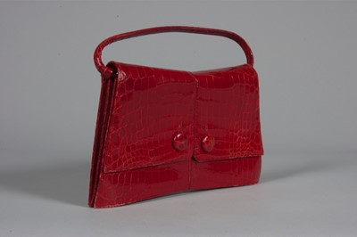 Lot 99 - A Christian Dior scarlet alligator handbag,...