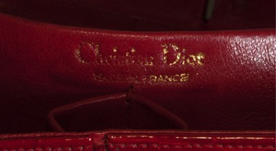 Lot 99 - A Christian Dior scarlet alligator handbag,...