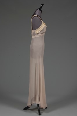 Lot 90 - A pale pink chiffon nightdress, circa 1935-40,...