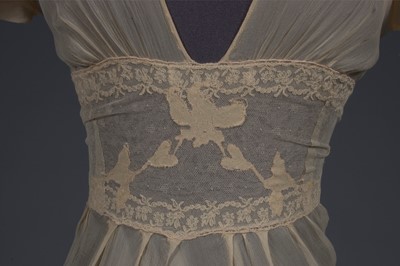Lot 87 - A lemon chiffon nightdress, late 1930s-mid...