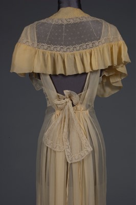 Lot 87 - A lemon chiffon nightdress, late 1930s-mid...