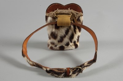 Lot 117 - A rare Schiaparelli waist pouch, 'boutique des...