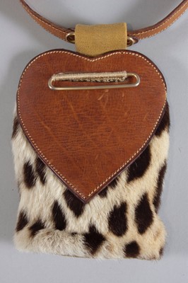 Lot 117 - A rare Schiaparelli waist pouch, 'boutique des...