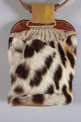 Lot 117 - A rare Schiaparelli waist pouch, 'boutique des...