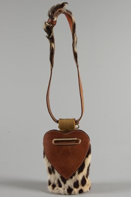 Lot 117 - A rare Schiaparelli waist pouch, 'boutique des...