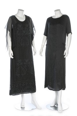 Lot 127 - Five mainly black dinner dresses, 1920s,...