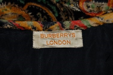 Lot 82 - A Burberry printed velvet evening jacket,...