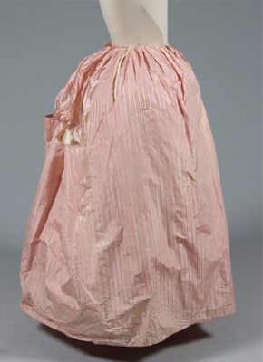 Lot 49 - A quilted ivory silk petticoat, circa 1760-80,...