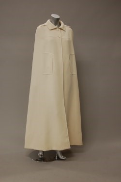 Lot 186 - A Courreges ivory wool maxi-cape, early 1970s,...