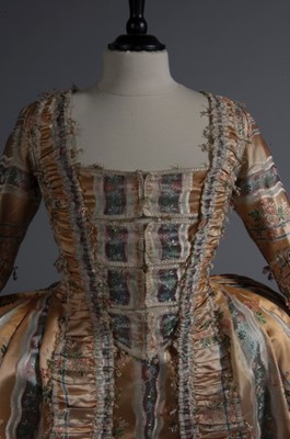 Lot 40 - A brocaded apricot robe à la française, circa...