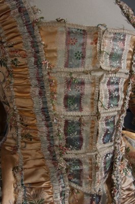 Lot 40 - A brocaded apricot robe à la française, circa...