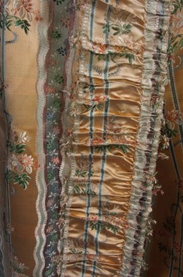 Lot 40 - A brocaded apricot robe à la française, circa...