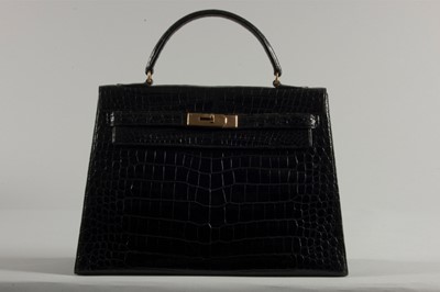 Lot 4 - An Hermès black crocodile Kelly bag, circa...