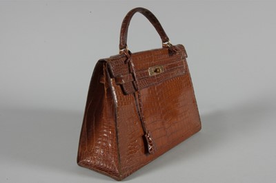 Lot 10 - An Hermès brown crocodile Kelly bag, circa...