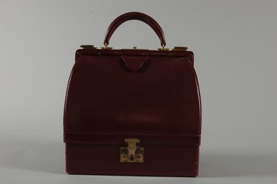 Lot 5 - An Hermès ox-blood leather malette bag, 1950s,...
