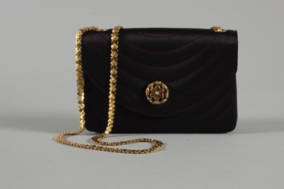 Lot 9 - A Chanel quilted satin evening bag, 1980s,...