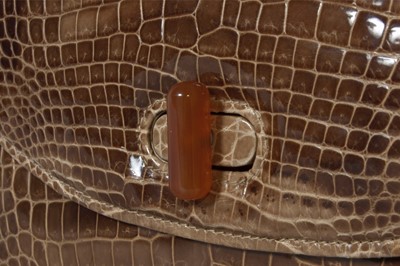 Lot 8 - A Gucci cafau lait crocodile handbag, 1960s,...