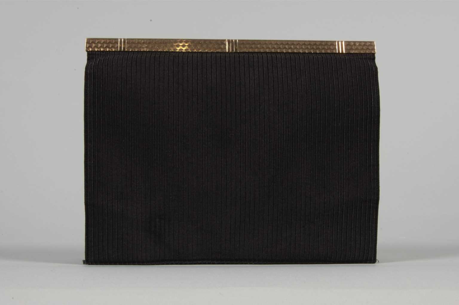 Lot 16 - A Cartier gold mounted black silk grosgrain...