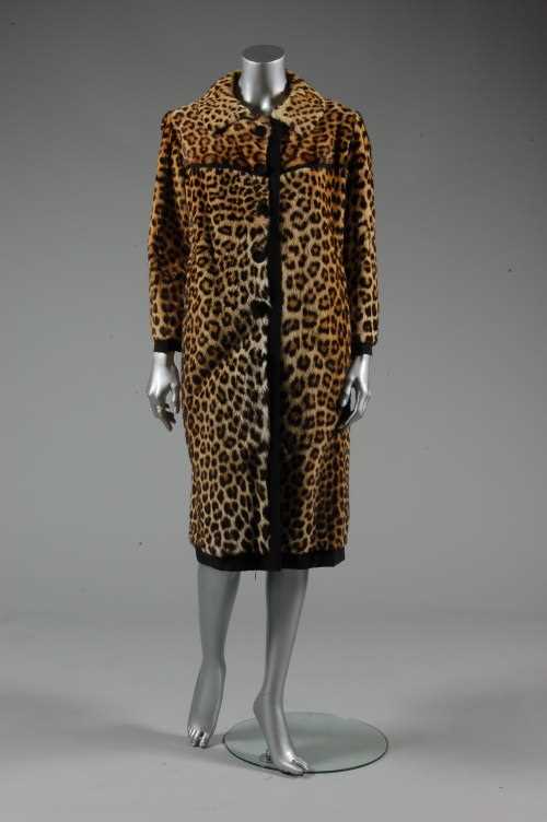 Lot 178 - A leopard skin coat, circa 1965, with black...