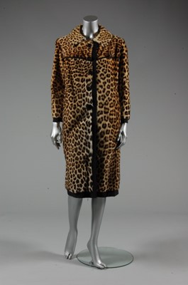 Lot 178 - A leopard skin coat, circa 1965, with black...