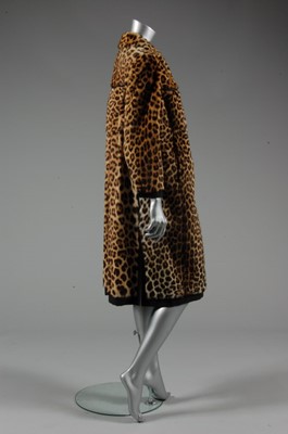 Lot 178 - A leopard skin coat, circa 1965, with black...