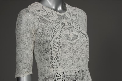 Lot 54 - An Irish crochet summer gown, circa 1910-12,...