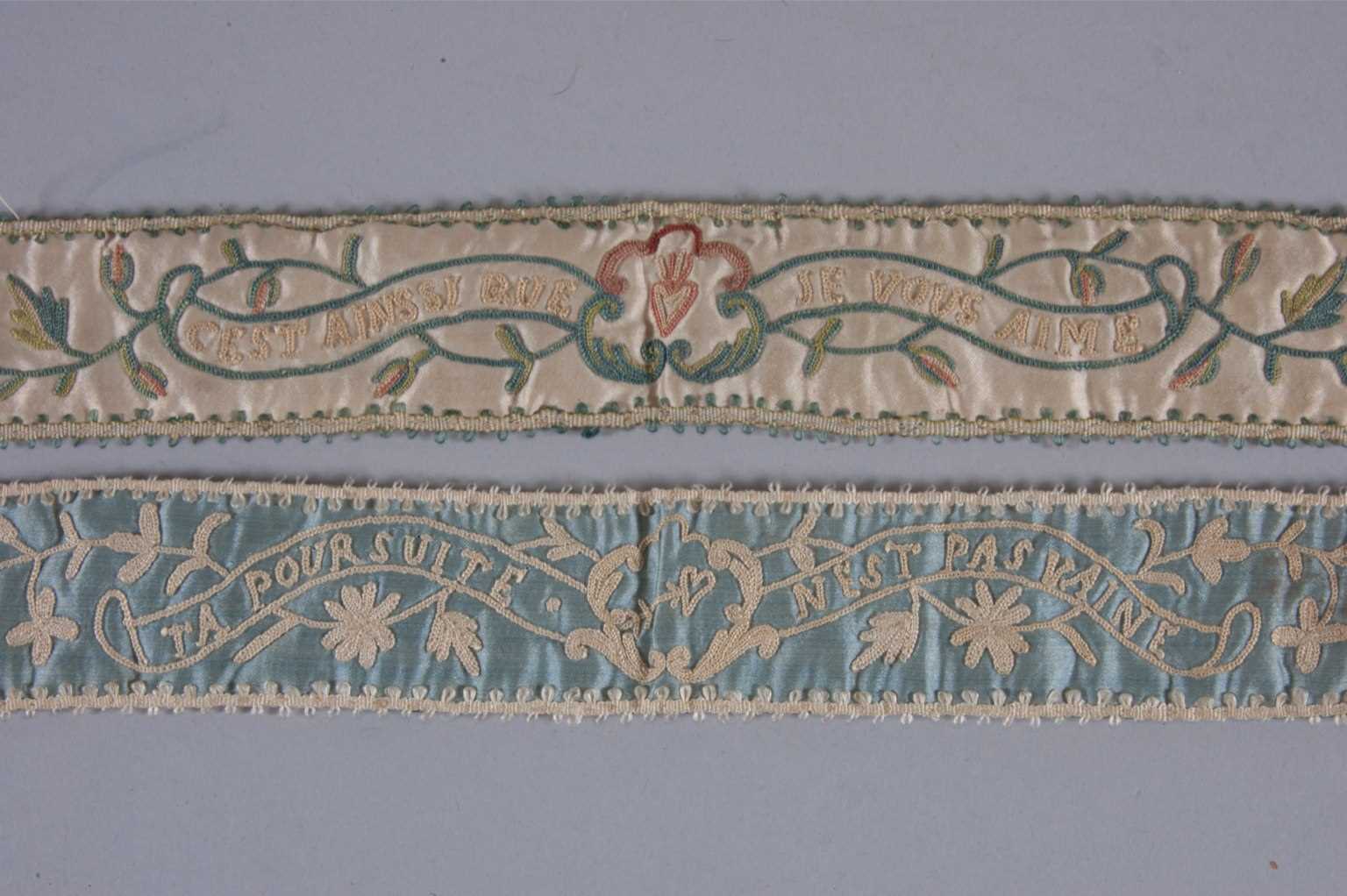 Lot 27 - Two pairs of embroidered garters with romantic...