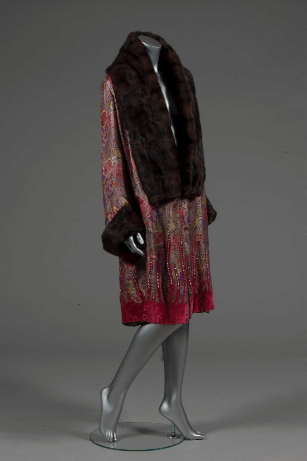 Lot 74 - An opera coat, late 1920s, of printed floral...