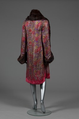 Lot 74 - An opera coat, late 1920s, of printed floral...