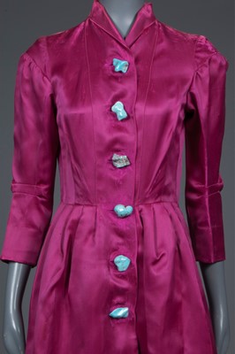 Lot 84 - A rare Schiaparelli shocking pink satin...