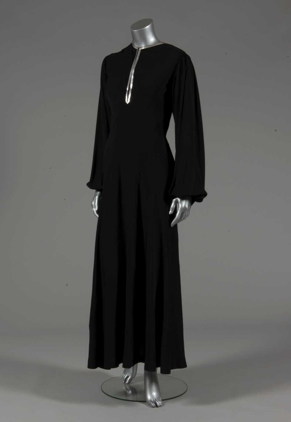 Lot 78 - A Jeanne Lanvin couture black silk crepe...