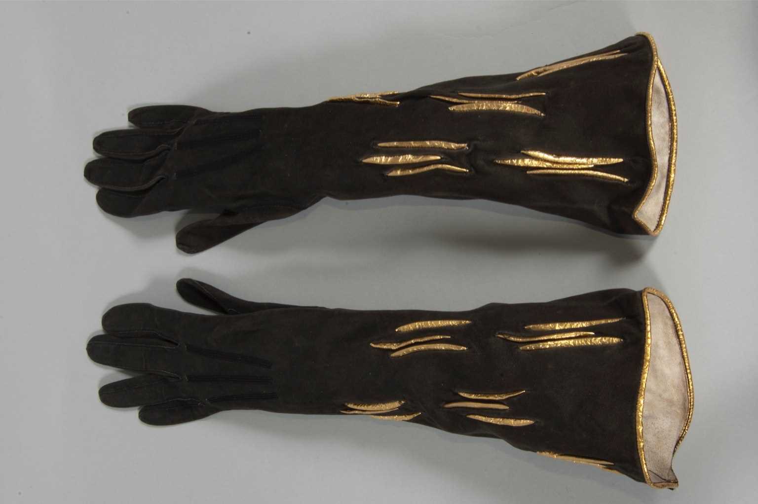 Lot 17 - A pair of Trefousse suede Schiaparelli-esque...