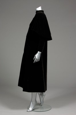 Lot 81 - A Balenciaga couture black velvet redingote,...