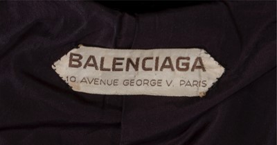 Lot 81 - A Balenciaga couture black velvet redingote,...