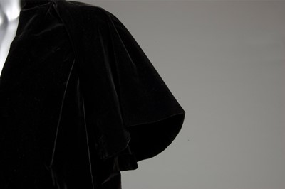 Lot 81 - A Balenciaga couture black velvet redingote,...