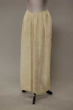 Lot 34 - A whitework embroidered apron panel, circa...