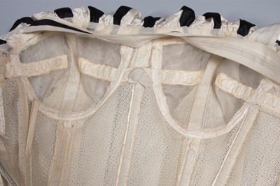 Lot 128 - A Pierre Balmain couture black satin and ivory...